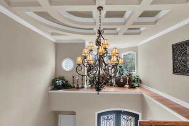 Welcome to this exquisite custom-built estate home perfectly on Wentworth Golf Club in Florida - for sale on GolfHomes.com, golf home, golf lot