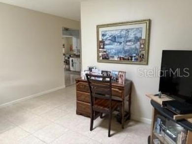 Wonderful Montgomery unit with combo living room, dining room on On Top of the World Golf Course in Florida - for sale on GolfHomes.com, golf home, golf lot