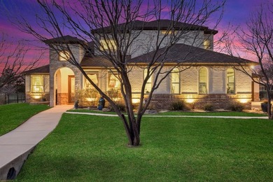 **ASSUMABLE LOAN AT 2.25%** Welcome to this custom-built on The Golf Club at Resort Eagle Mountain Lake in Texas - for sale on GolfHomes.com, golf home, golf lot