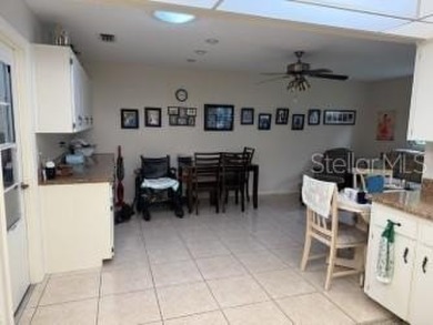 Wonderful Montgomery unit with combo living room, dining room on On Top of the World Golf Course in Florida - for sale on GolfHomes.com, golf home, golf lot