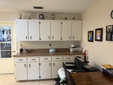 Wonderful Montgomery unit with combo living room, dining room on On Top of the World Golf Course in Florida - for sale on GolfHomes.com, golf home, golf lot