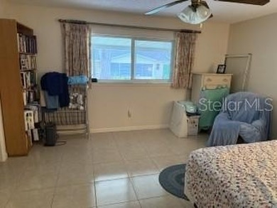 Wonderful Montgomery unit with combo living room, dining room on On Top of the World Golf Course in Florida - for sale on GolfHomes.com, golf home, golf lot