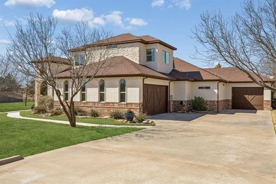 **ASSUMABLE LOAN AT 2.25%** Welcome to this custom-built on The Golf Club at Resort Eagle Mountain Lake in Texas - for sale on GolfHomes.com, golf home, golf lot