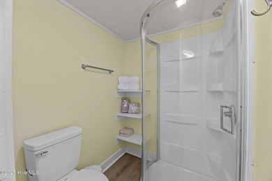 Fresh Paint 8/25 - This beautiful, partially furnished condo on Harbour Point Golf Club in North Carolina - for sale on GolfHomes.com, golf home, golf lot