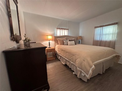 Welcome to Holiday Park! This turn-key furnished LAND-OWNED on Sabal Trace Golf and Country Club in Florida - for sale on GolfHomes.com, golf home, golf lot