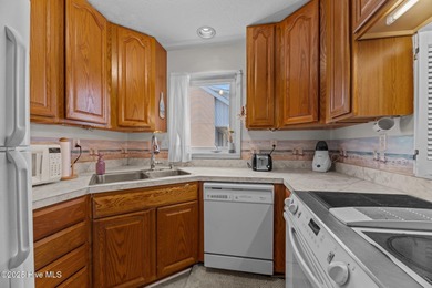 Fresh Paint 8/25 - This beautiful, partially furnished condo on Harbour Point Golf Club in North Carolina - for sale on GolfHomes.com, golf home, golf lot