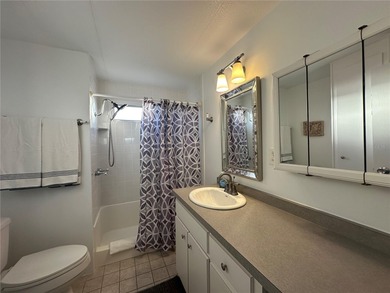 Welcome to Holiday Park! This turn-key furnished LAND-OWNED on Sabal Trace Golf and Country Club in Florida - for sale on GolfHomes.com, golf home, golf lot