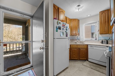 Fresh Paint 8/25 - This beautiful, partially furnished condo on Harbour Point Golf Club in North Carolina - for sale on GolfHomes.com, golf home, golf lot