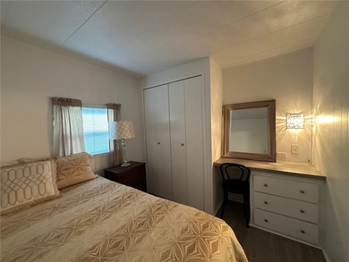 Welcome to Holiday Park! This turn-key furnished LAND-OWNED on Sabal Trace Golf and Country Club in Florida - for sale on GolfHomes.com, golf home, golf lot