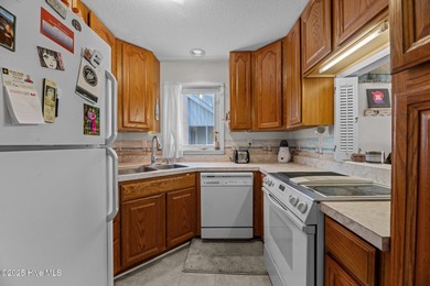 Fresh Paint 8/25 - This beautiful, partially furnished condo on Harbour Point Golf Club in North Carolina - for sale on GolfHomes.com, golf home, golf lot