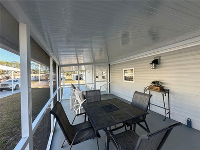 Welcome to Holiday Park! This turn-key furnished LAND-OWNED on Sabal Trace Golf and Country Club in Florida - for sale on GolfHomes.com, golf home, golf lot