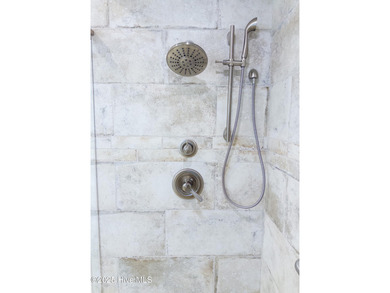 Overlooking the lush 10th fairway, this beautifully maintained on Porters Neck Country Club in North Carolina - for sale on GolfHomes.com, golf home, golf lot