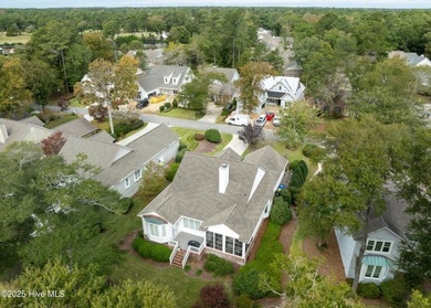 Overlooking the lush 10th fairway, this beautifully maintained on Porters Neck Country Club in North Carolina - for sale on GolfHomes.com, golf home, golf lot