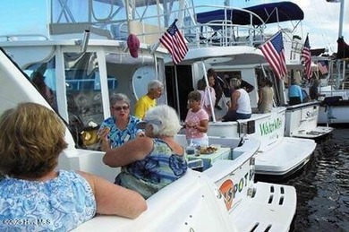 Fresh Paint 8/25 - This beautiful, partially furnished condo on Harbour Point Golf Club in North Carolina - for sale on GolfHomes.com, golf home, golf lot