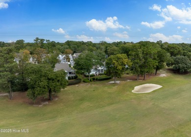 Overlooking the lush 10th fairway, this beautifully maintained on Porters Neck Country Club in North Carolina - for sale on GolfHomes.com, golf home, golf lot