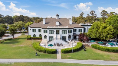 Overlooking the lush 10th fairway, this beautifully maintained on Porters Neck Country Club in North Carolina - for sale on GolfHomes.com, golf home, golf lot