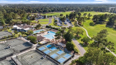 Overlooking the lush 10th fairway, this beautifully maintained on Porters Neck Country Club in North Carolina - for sale on GolfHomes.com, golf home, golf lot