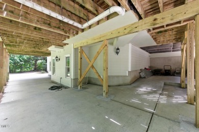 Welcome to 137 Forked Pine Court, a custom-built luxury estate on The Preserve At Jordan Lake Golf Club in North Carolina - for sale on GolfHomes.com, golf home, golf lot