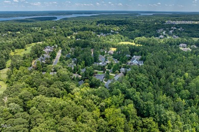 INCREDIBLE 30k PRICE IMPROVEMENT! Discover refined luxury and on The Preserve At Jordan Lake Golf Club in North Carolina - for sale on GolfHomes.com, golf home, golf lot