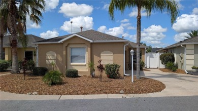 This charming 2-bedroom, 2-bathroom courtyard villa offers 1,132 on The Links of Spruce Creek in Florida - for sale on GolfHomes.com, golf home, golf lot