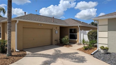 This charming 2-bedroom, 2-bathroom courtyard villa offers 1,132 on The Links of Spruce Creek in Florida - for sale on GolfHomes.com, golf home, golf lot