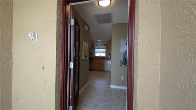 This charming 2-bedroom, 2-bathroom courtyard villa offers 1,132 on The Links of Spruce Creek in Florida - for sale on GolfHomes.com, golf home, golf lot
