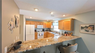 This charming 2-bedroom, 2-bathroom courtyard villa offers 1,132 on The Links of Spruce Creek in Florida - for sale on GolfHomes.com, golf home, golf lot