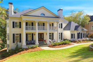 COMMANDING MASSIVE PALATIAL COLUMNS, THIS SUGARLOAF COUNTRY CLUB on TPC At Sugarloaf Golf Club in Georgia - for sale on GolfHomes.com, golf home, golf lot