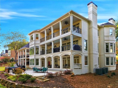 COMMANDING MASSIVE PALATIAL COLUMNS, THIS SUGARLOAF COUNTRY CLUB on TPC At Sugarloaf Golf Club in Georgia - for sale on GolfHomes.com, golf home, golf lot