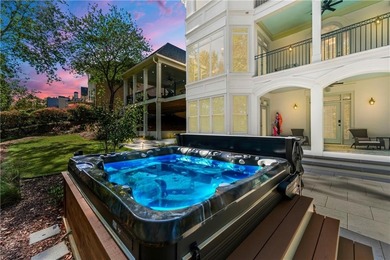 COMMANDING MASSIVE PALATIAL COLUMNS, THIS SUGARLOAF COUNTRY CLUB on TPC At Sugarloaf Golf Club in Georgia - for sale on GolfHomes.com, golf home, golf lot