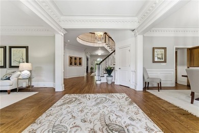 COMMANDING MASSIVE PALATIAL COLUMNS, THIS SUGARLOAF COUNTRY CLUB on TPC At Sugarloaf Golf Club in Georgia - for sale on GolfHomes.com, golf home, golf lot