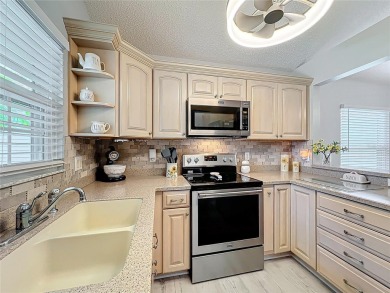 Beautifully Updated 2BR + Den + Florida Room in Golfview Village on Plantation Golf Club in Florida - for sale on GolfHomes.com, golf home, golf lot