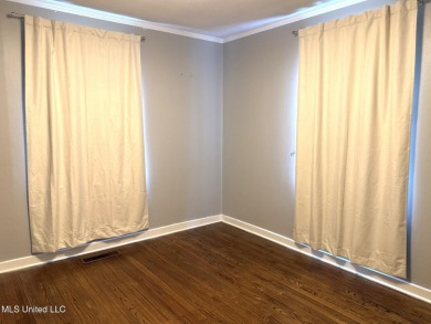 NEW TO THE MARKET IS THIS 3 BEDROOM, 2 BATH HOME JUST ONE BLOCK on Duncan Park Golf Course in Mississippi - for sale on GolfHomes.com, golf home, golf lot