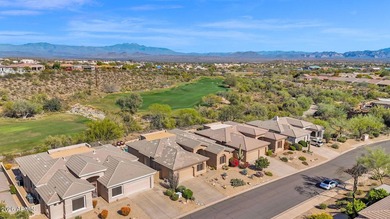 Executive golf course home in Sunridge Canyon overlooking the on SunRidge Canyon Golf Club in Arizona - for sale on GolfHomes.com, golf home, golf lot