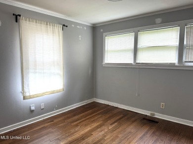 NEW TO THE MARKET IS THIS 3 BEDROOM, 2 BATH HOME JUST ONE BLOCK on Duncan Park Golf Course in Mississippi - for sale on GolfHomes.com, golf home, golf lot