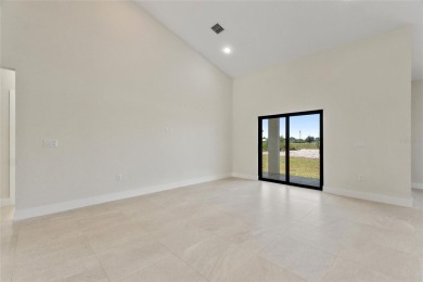 STUNNING NEW CONSTRUCTION HOME in Indian Lake Estates - Golf on Indian Lake Estates Golf and Country Club in Florida - for sale on GolfHomes.com, golf home, golf lot