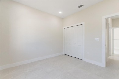 STUNNING NEW CONSTRUCTION HOME in Indian Lake Estates - Golf on Indian Lake Estates Golf and Country Club in Florida - for sale on GolfHomes.com, golf home, golf lot