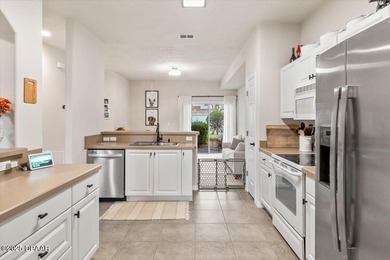 This well-kept townhome in Venetian Bay offers 2 bedrooms, 2.5 on Venetian Bay Golf Course in Florida - for sale on GolfHomes.com, golf home, golf lot