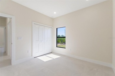 STUNNING NEW CONSTRUCTION HOME in Indian Lake Estates - Golf on Indian Lake Estates Golf and Country Club in Florida - for sale on GolfHomes.com, golf home, golf lot