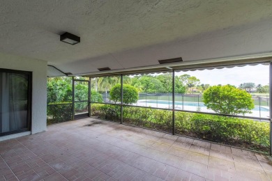 This gorgeous pool home is situated on a larger, 1.13-acre on The Wanderers Club in Florida - for sale on GolfHomes.com, golf home, golf lot