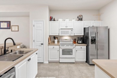 This well-kept townhome in Venetian Bay offers 2 bedrooms, 2.5 on Venetian Bay Golf Course in Florida - for sale on GolfHomes.com, golf home, golf lot