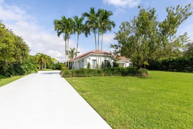 This gorgeous pool home is situated on a larger, 1.13-acre on The Wanderers Club in Florida - for sale on GolfHomes.com, golf home, golf lot