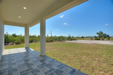STUNNING NEW CONSTRUCTION HOME in Indian Lake Estates - Golf on Indian Lake Estates Golf and Country Club in Florida - for sale on GolfHomes.com, golf home, golf lot