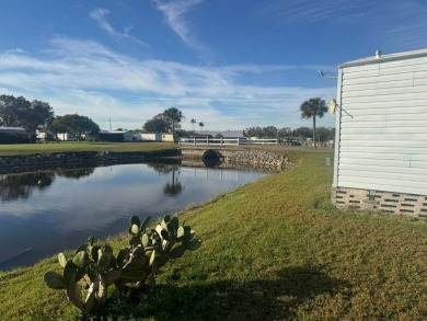 Do you enjoy a beautiful water view with the sun bouncing off on Golden Lakes Golf Course in Florida - for sale on GolfHomes.com, golf home, golf lot