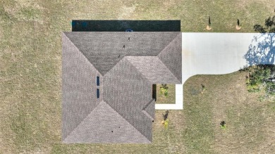STUNNING NEW CONSTRUCTION HOME in Indian Lake Estates - Golf on Indian Lake Estates Golf and Country Club in Florida - for sale on GolfHomes.com, golf home, golf lot