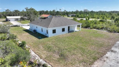 STUNNING NEW CONSTRUCTION HOME in Indian Lake Estates - Golf on Indian Lake Estates Golf and Country Club in Florida - for sale on GolfHomes.com, golf home, golf lot