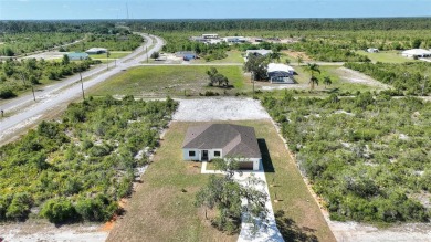 STUNNING NEW CONSTRUCTION HOME in Indian Lake Estates - Golf on Indian Lake Estates Golf and Country Club in Florida - for sale on GolfHomes.com, golf home, golf lot