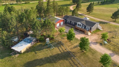 Welcome to your dream home in the beautiful Black Hills! This on Hart Ranch Golf Club in South Dakota - for sale on GolfHomes.com, golf home, golf lot