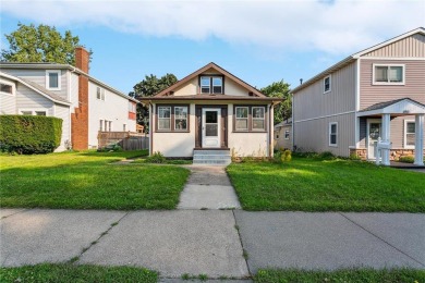 This 3-bedroom, 2-bath home features beautiful natural woodwork on Phalen Park Golf Course in Minnesota - for sale on GolfHomes.com, golf home, golf lot