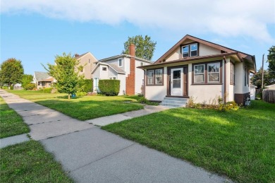 This 3-bedroom, 2-bath home features beautiful natural woodwork on Phalen Park Golf Course in Minnesota - for sale on GolfHomes.com, golf home, golf lot